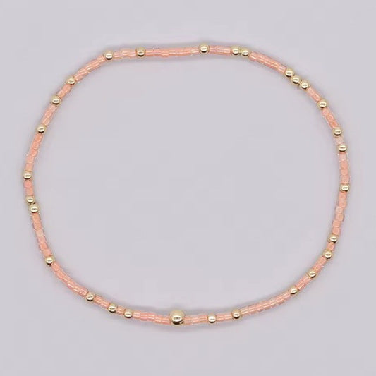 BOHO PEACH AND GOLD BEADED BRACELET
