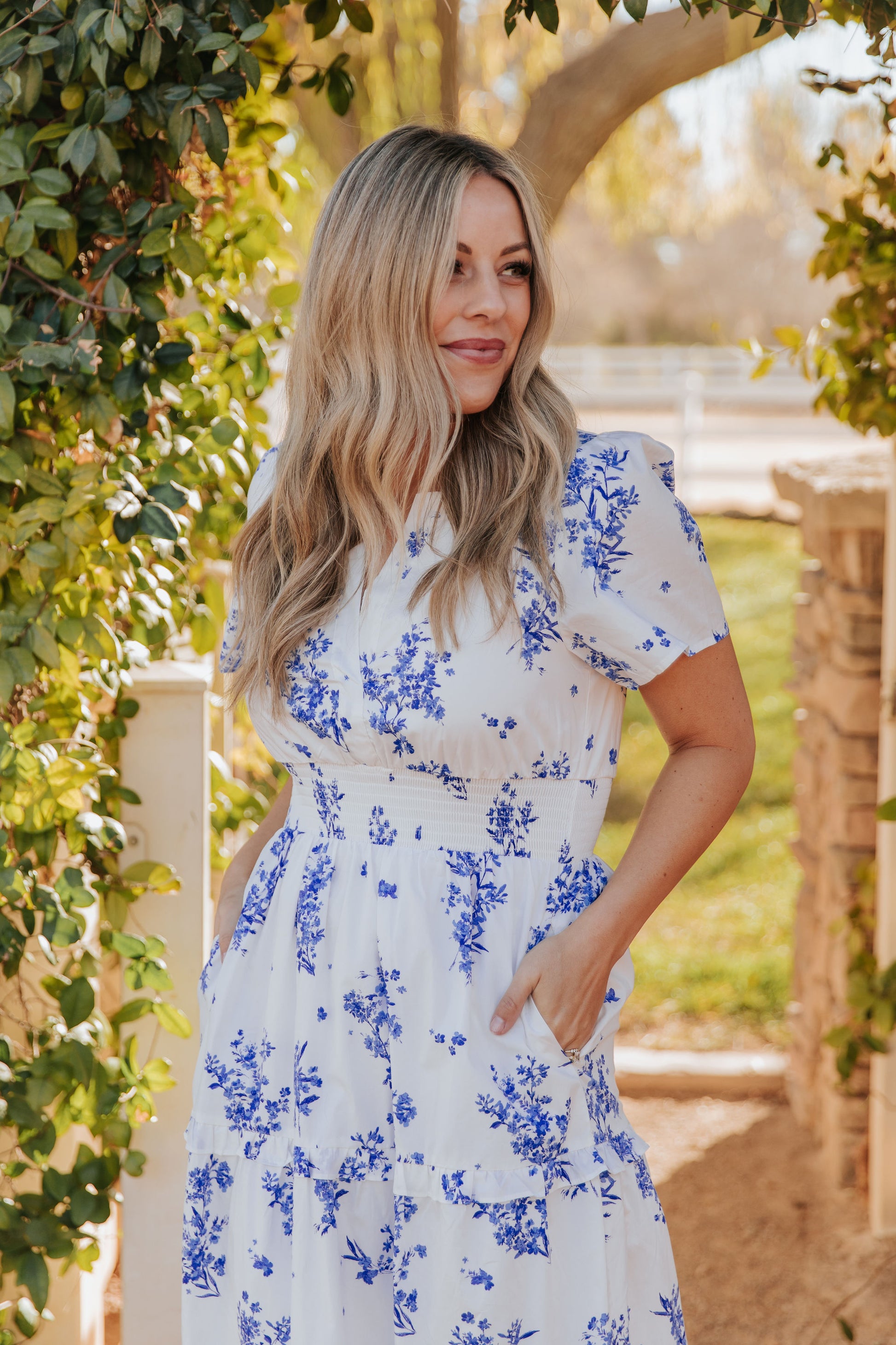 THE PALMER POPLIN DRESS IN BLUE FLORAL Pink Desert THE PALMER POPLIN DRESS IN BLUE FLORAL Pink Desert