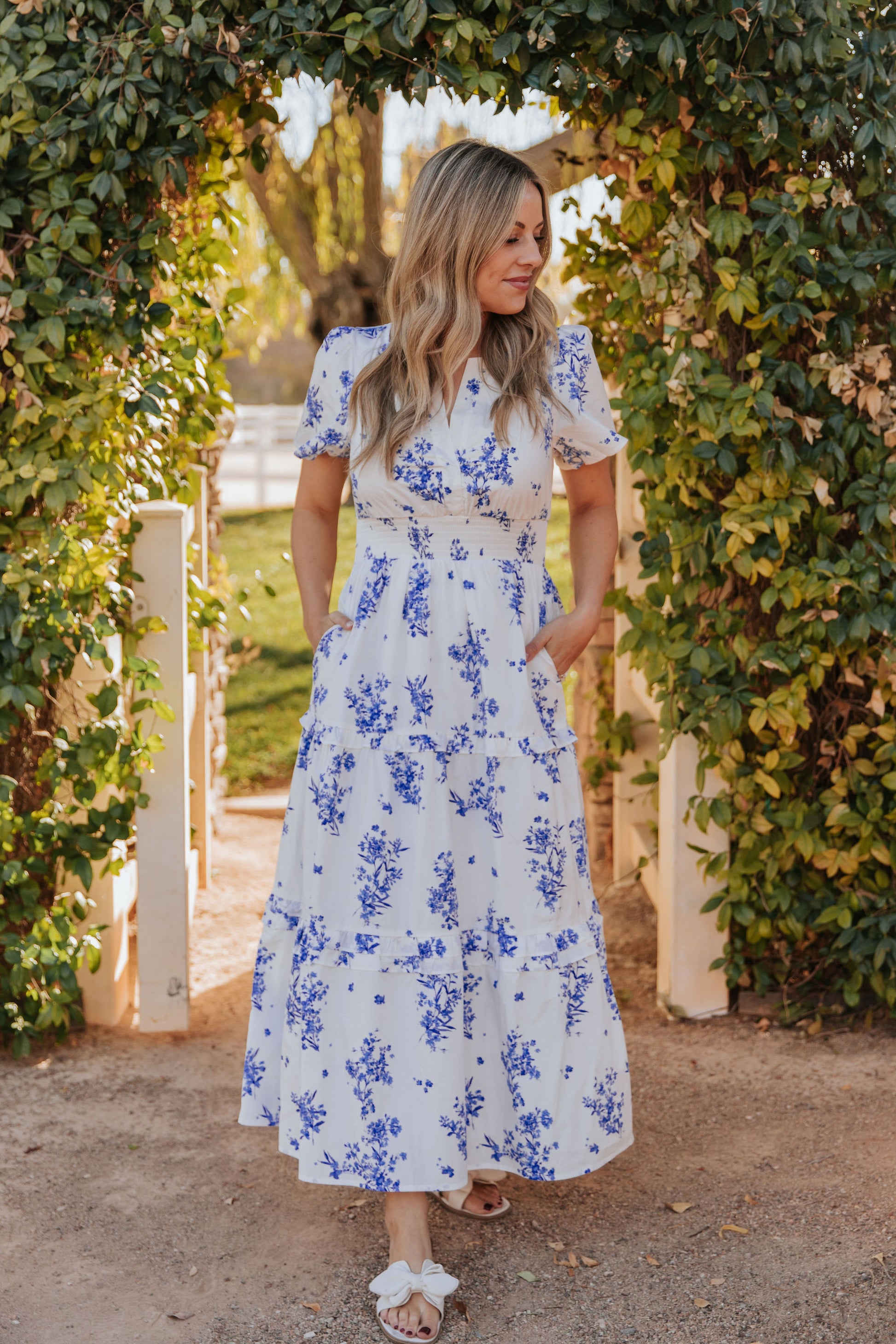 THE PALMER POPLIN DRESS IN BLUE FLORAL Pink Desert THE PALMER POPLIN DRESS IN BLUE FLORAL Pink Desert