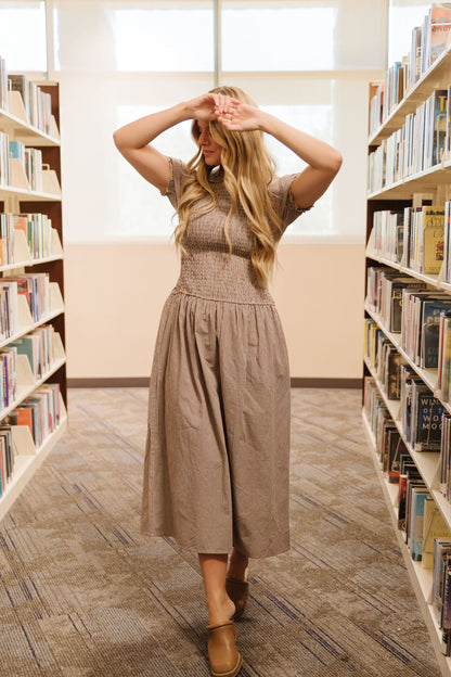 THE LANEY SMOCKED GINGHAM MIDI DRESS IN BROWN