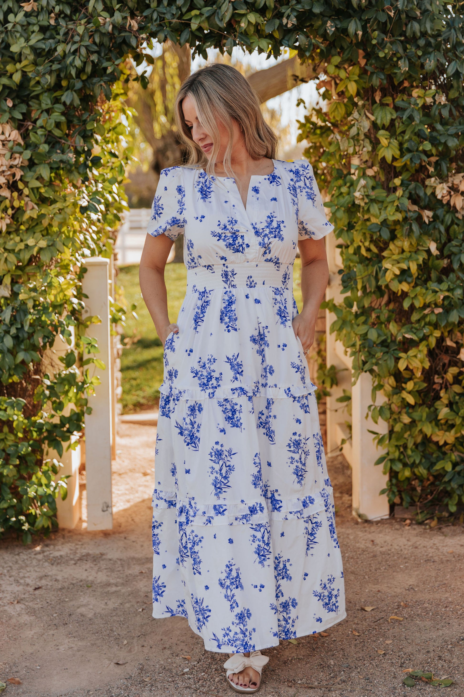 THE PALMER POPLIN DRESS IN BLUE FLORAL Pink Desert THE PALMER POPLIN DRESS IN BLUE FLORAL Pink Desert