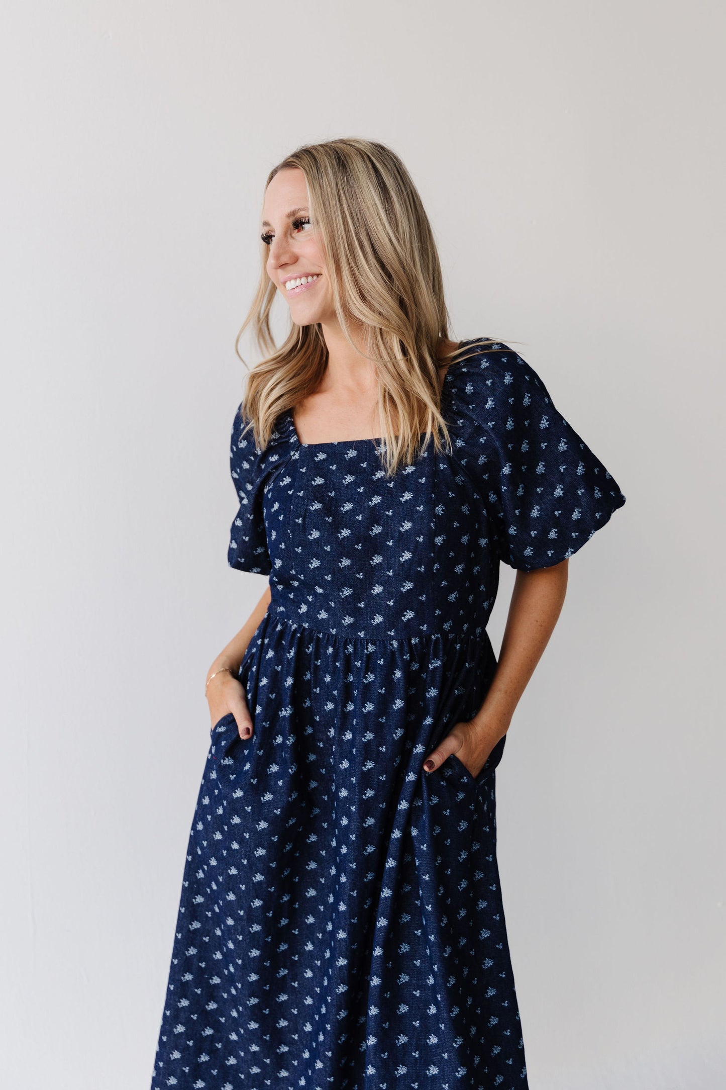 THE MAKENZIE FLORAL JACQUARD DENIM DRESS IN BLUE