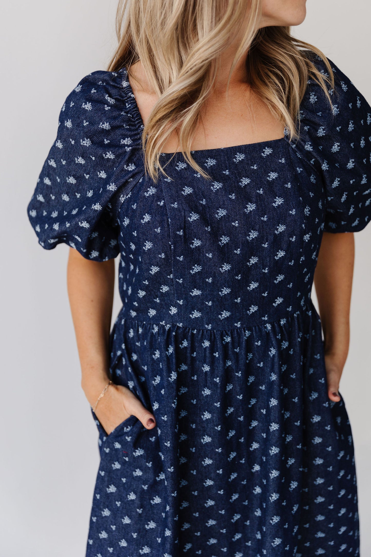 THE MAKENZIE FLORAL JACQUARD DENIM DRESS IN BLUE