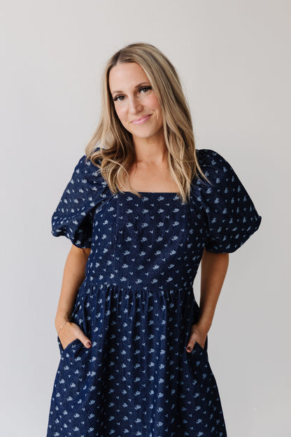 THE MAKENZIE FLORAL JACQUARD DENIM DRESS IN BLUE