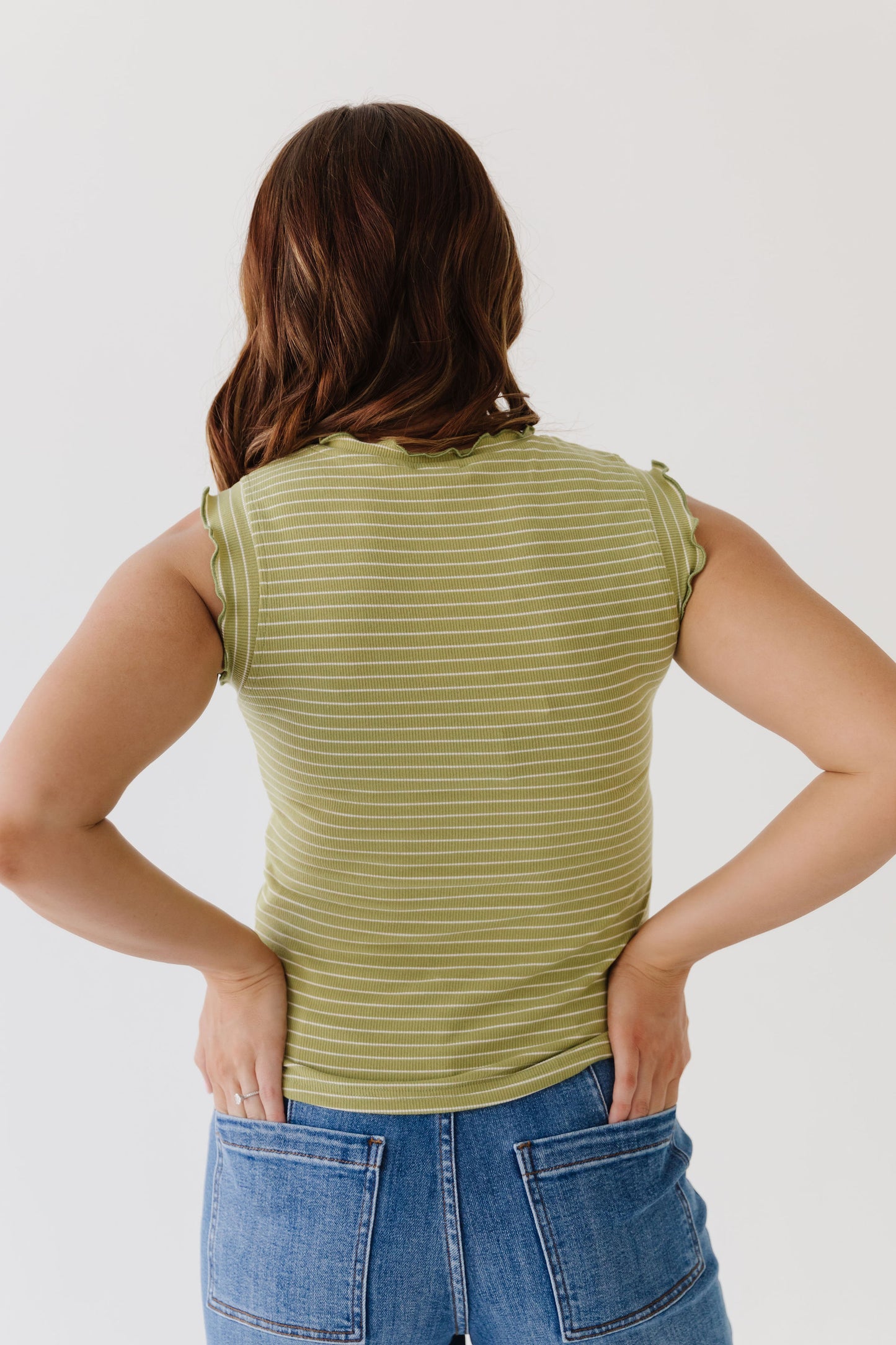 THE ALEXIS FRILL TANK IN GREEN