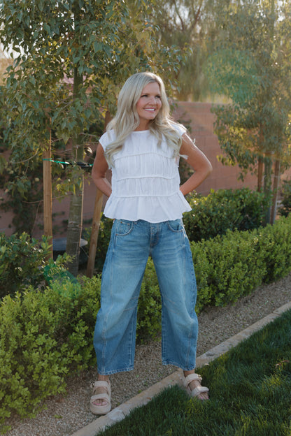 THE ANDREA RUCHED PEPLUM TOP IN WHITE