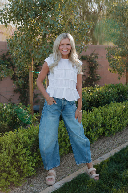 THE ANDREA RUCHED PEPLUM TOP IN WHITE