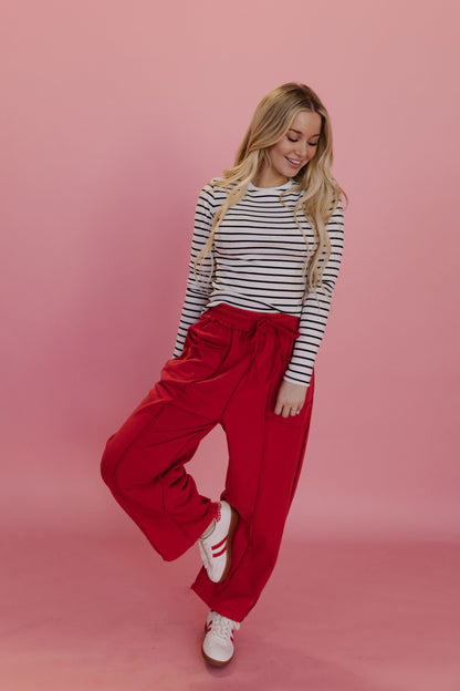 THE GAIA BARREL KNIT UTILITY PANTS IN RED