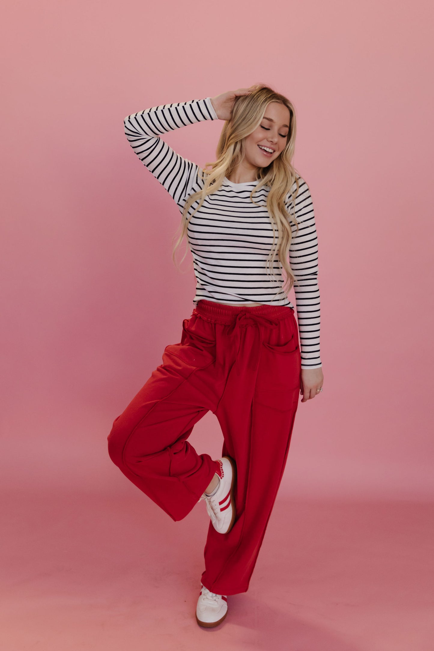 THE GAIA BARREL KNIT UTILITY PANTS IN RED