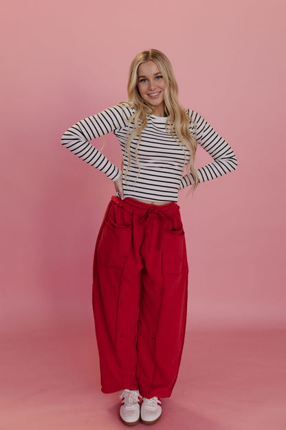 THE GAIA BARREL KNIT UTILITY PANTS IN RED