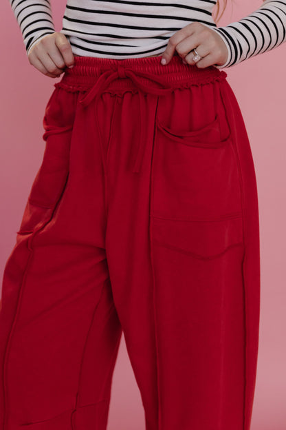 THE GAIA BARREL KNIT UTILITY PANTS IN RED