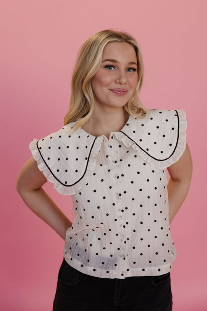 THE ALLISON POLKA DOT RUFFLE TOP IN IVORY