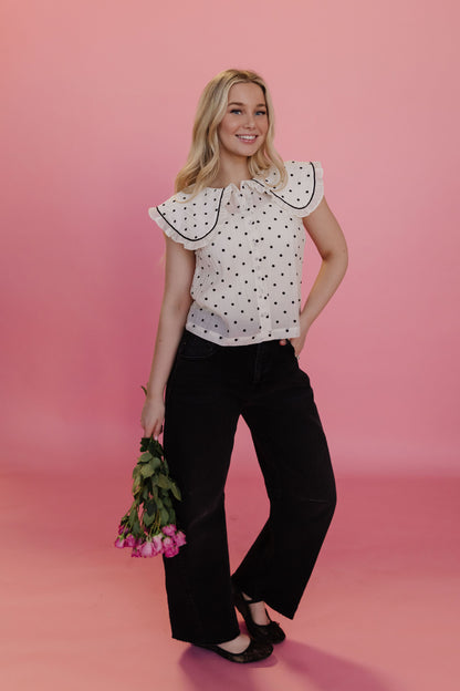 THE ALLISON POLKA DOT RUFFLE TOP IN IVORY