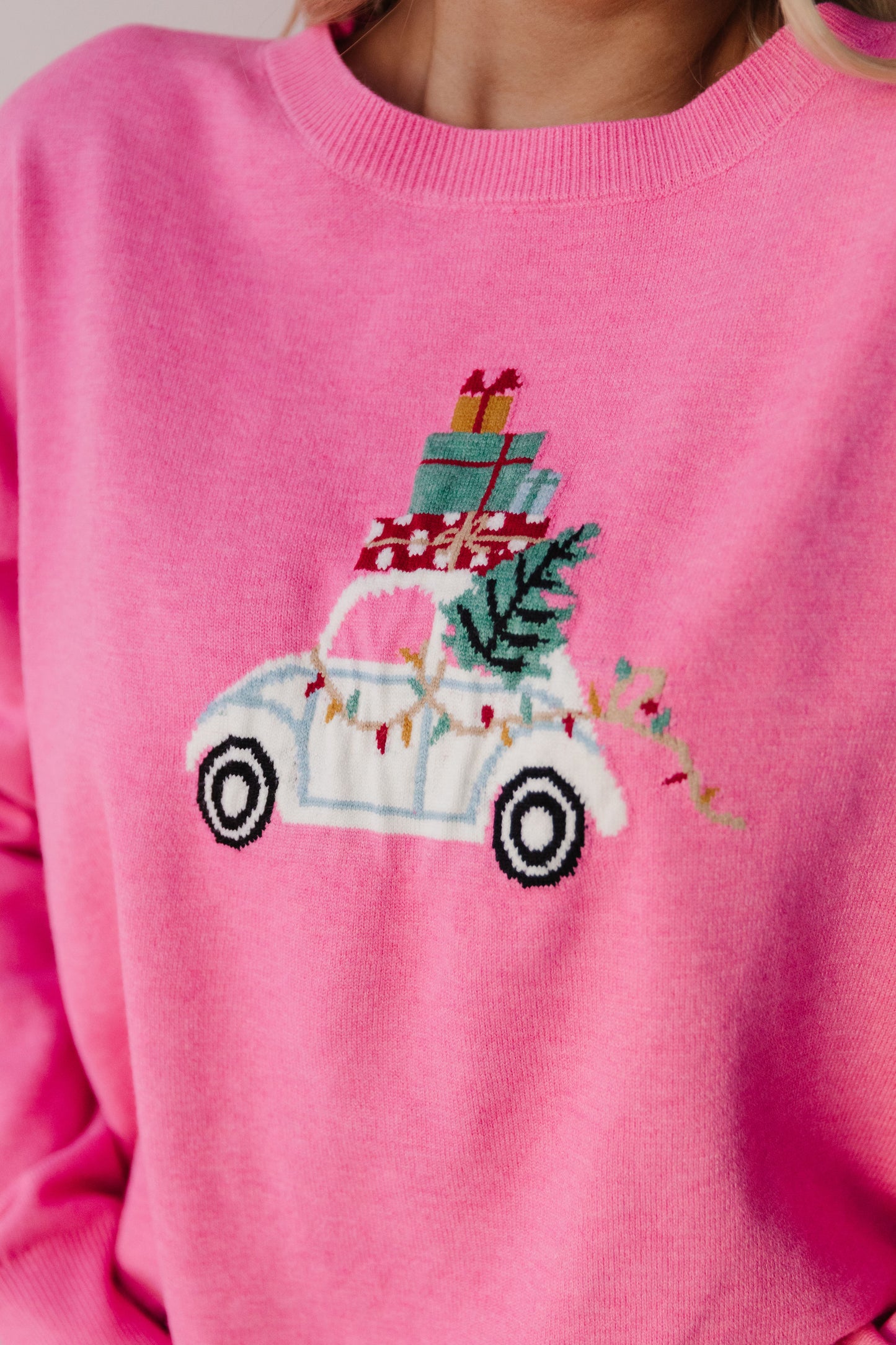 THE HOLIDAY SHOPPING SWEATER IN PINK