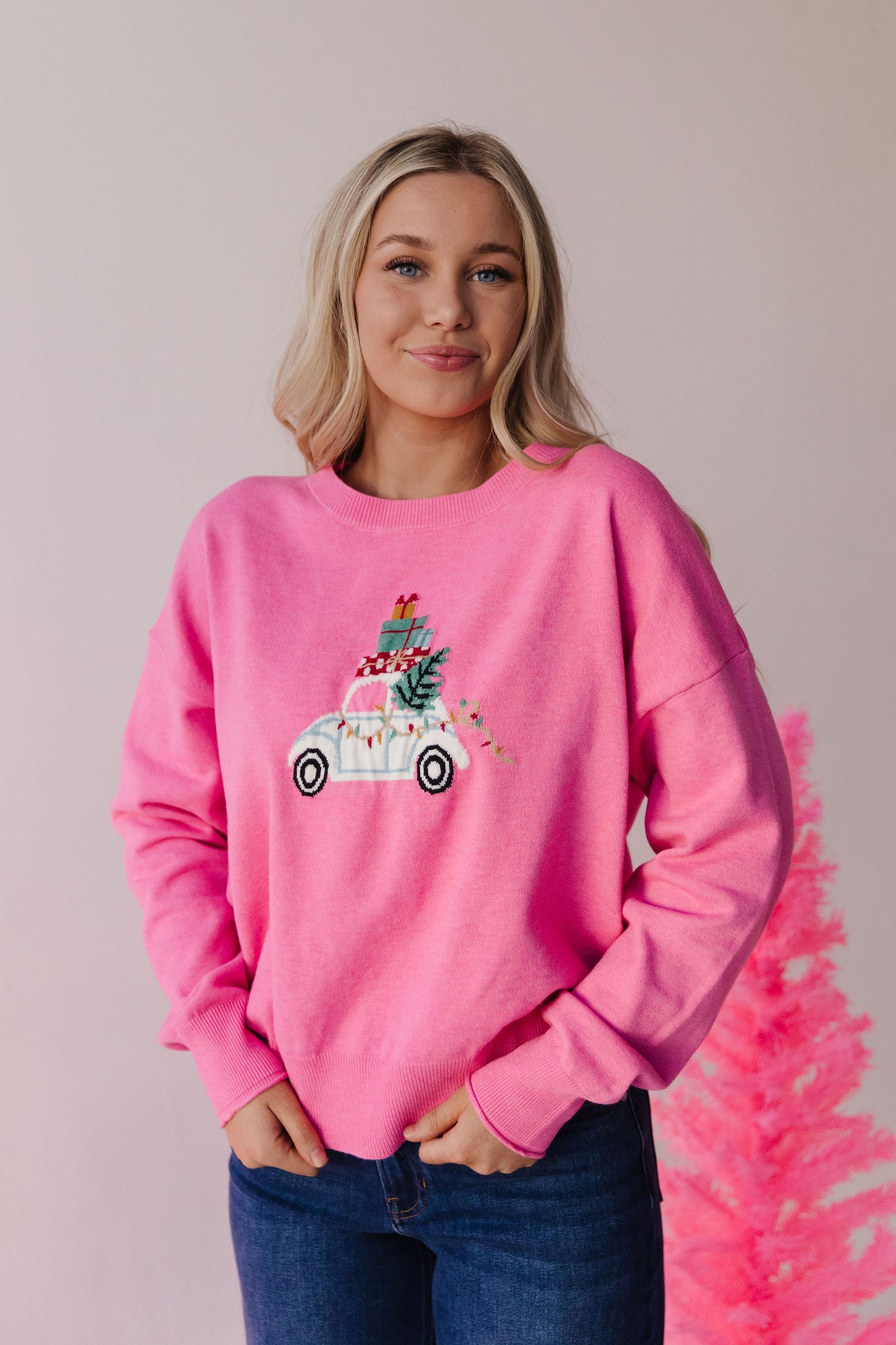 THE HOLIDAY SHOPPING SWEATER IN PINK