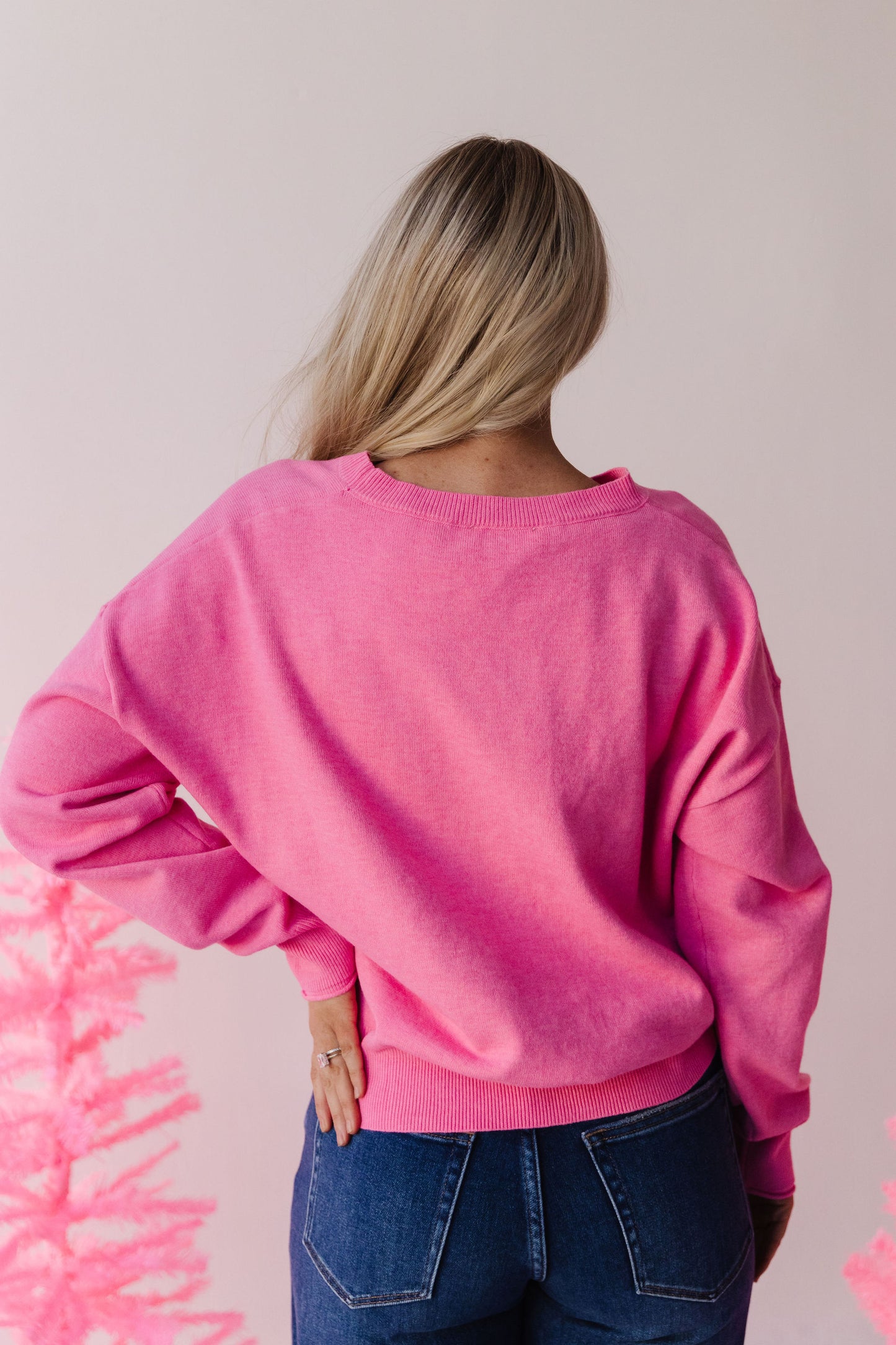 THE HOLIDAY SHOPPING SWEATER IN PINK