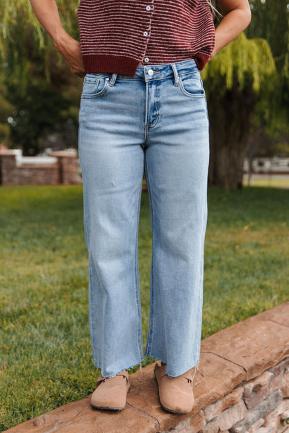 THE MEGAN MIDRISE RAW HEM JEANS