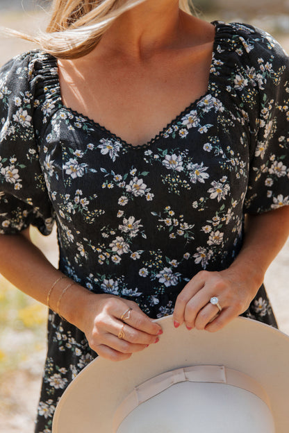 THE EMMY LOU DRESS IN BLACK FLORAL BY PINK DESERT