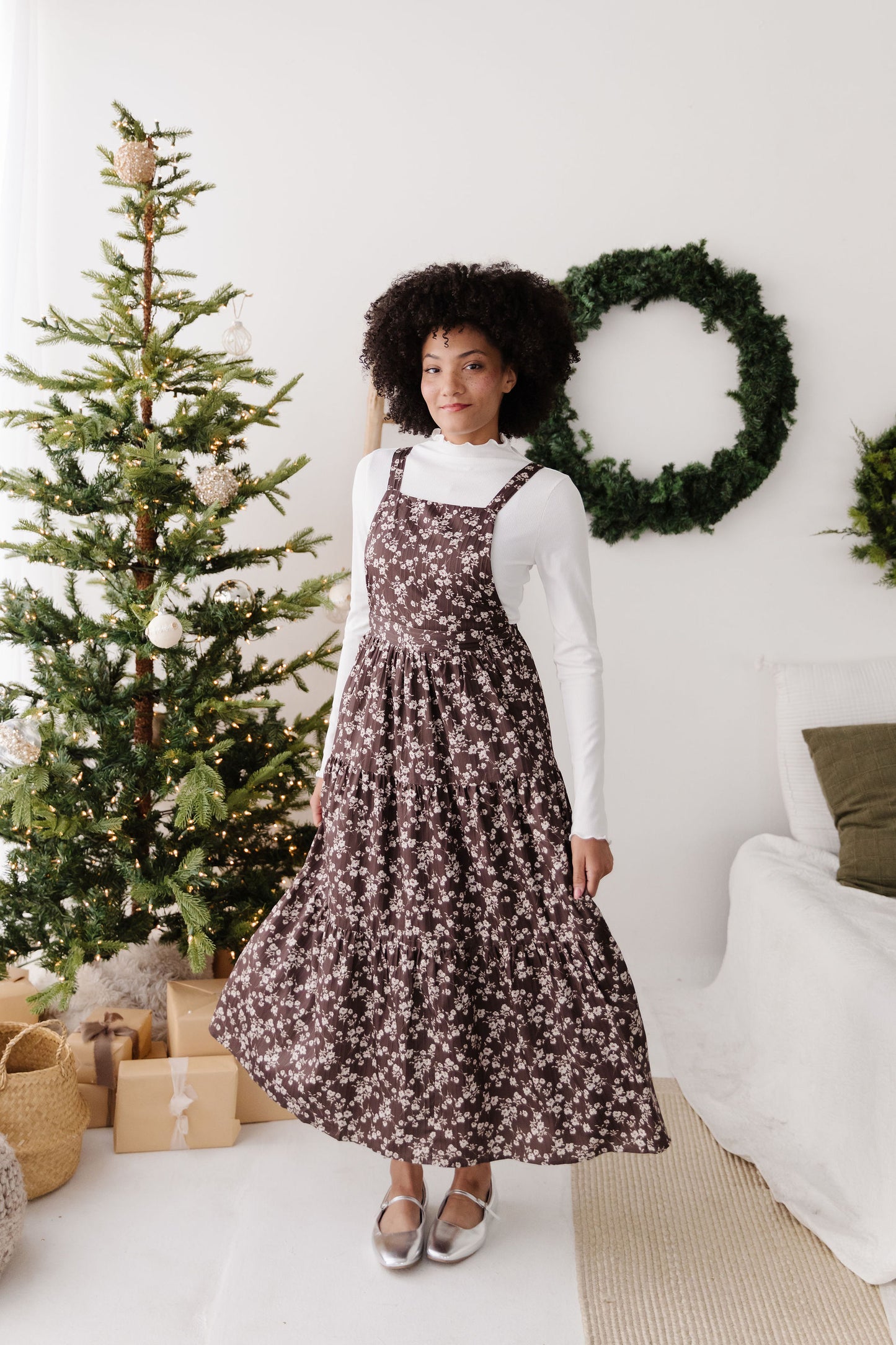 THE DANNY FLORAL OVERALL DRESS IN BROWN