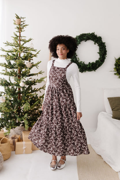 THE DANNY FLORAL OVERALL DRESS IN BROWN