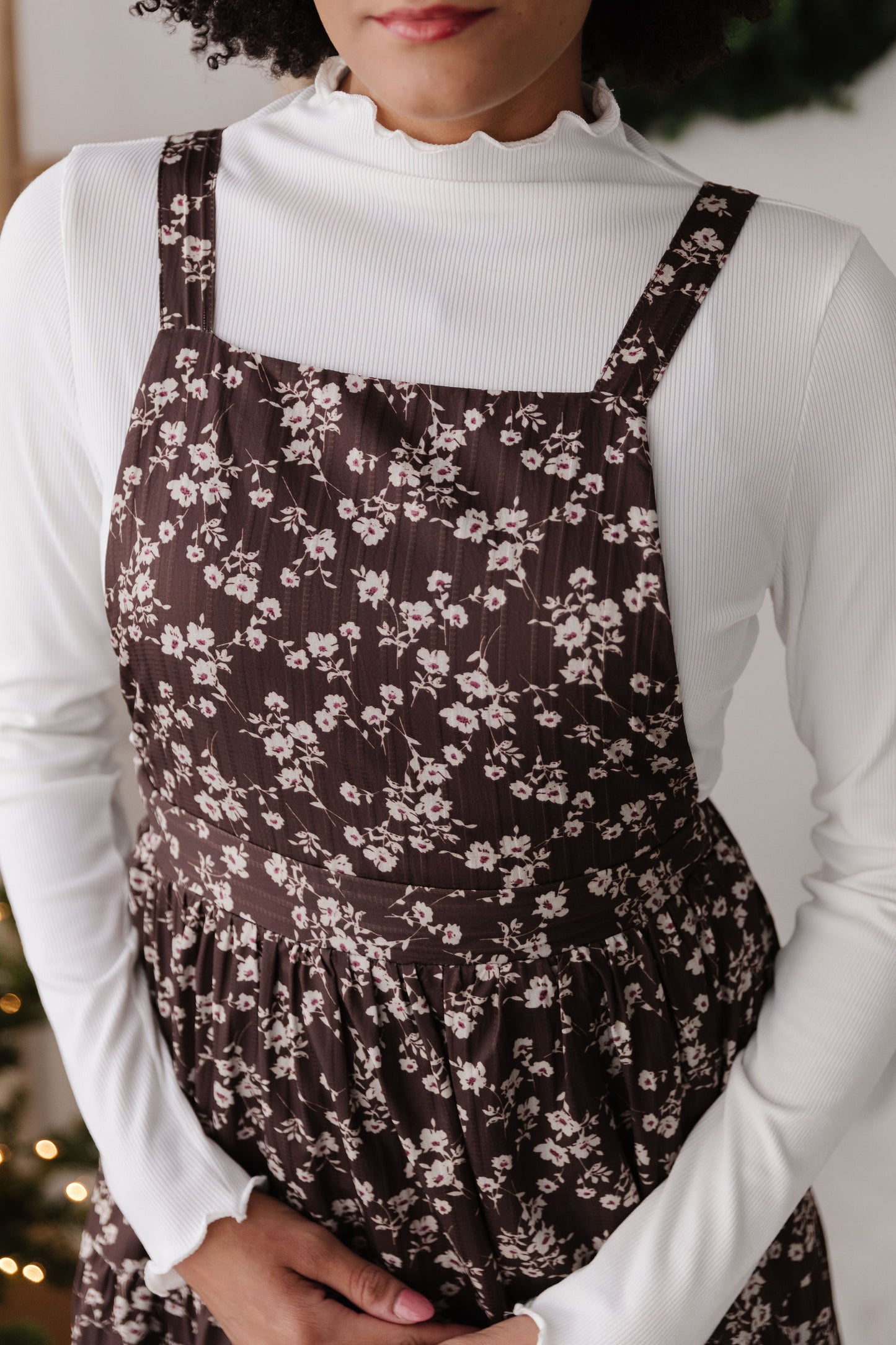 THE DANNY FLORAL OVERALL DRESS IN BROWN