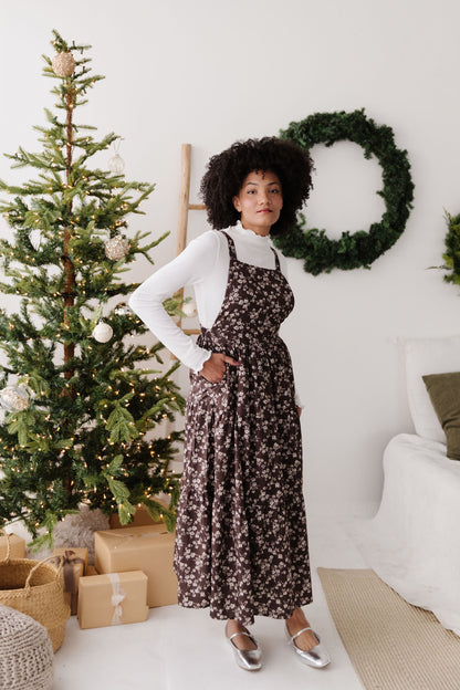 THE DANNY FLORAL OVERALL DRESS IN BROWN