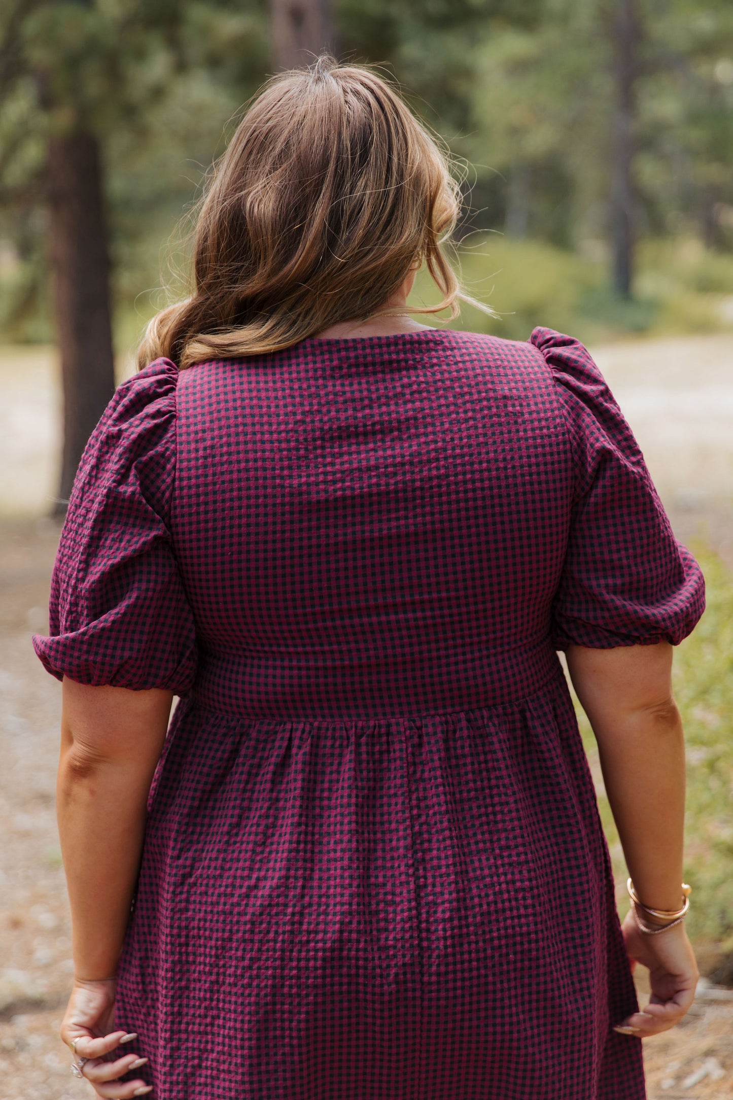 THE HARLOW BOW DRESS IN BURGUNDY CHECKERED BY PINK DESERT