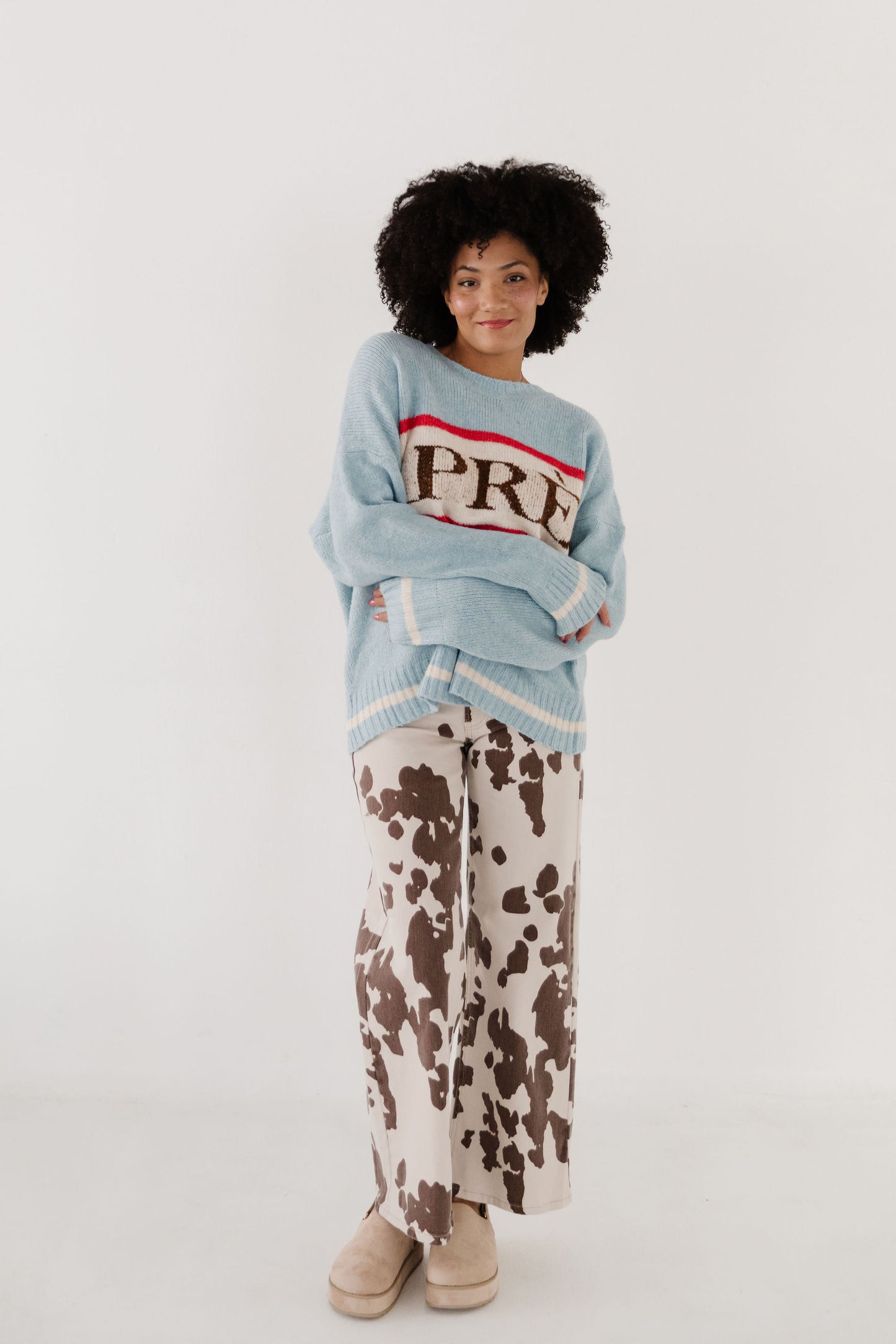 THE BESSIE COW PRINT JEANS IN CREAM