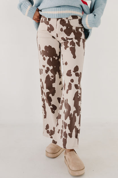 THE BESSIE COW PRINT JEANS IN CREAM