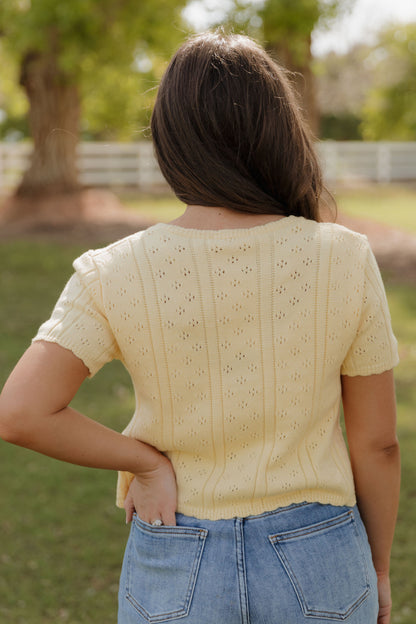THE KAILEY TIE-FRONT KNIT TOP IN YELLOW