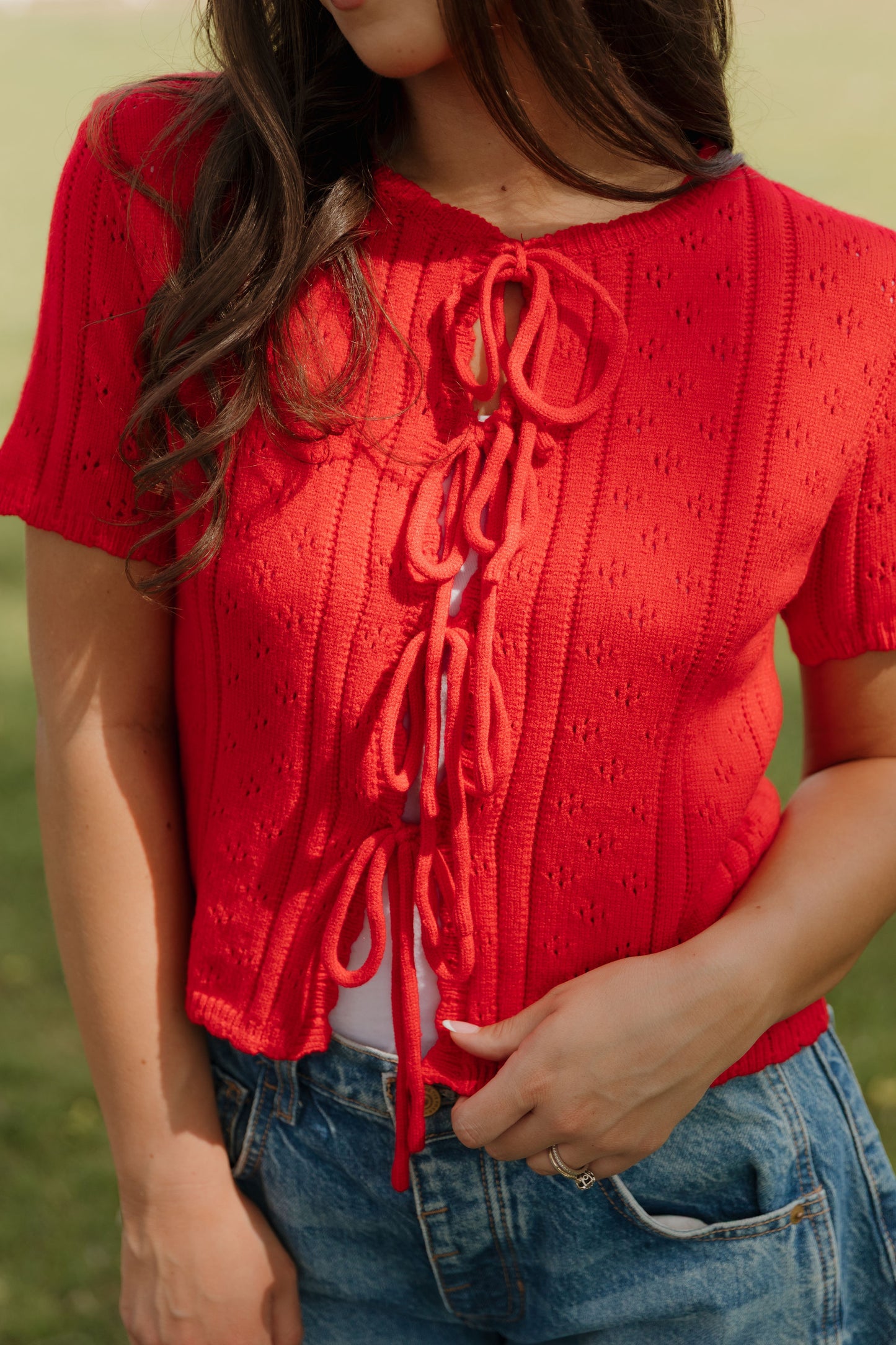 THE KAILEY TIE-FRONT KNIT TOP IN RED