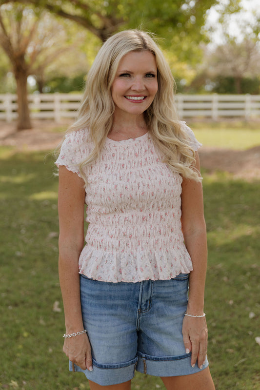 THE MADISON SMOCKED FLORAL TOP IN PINK