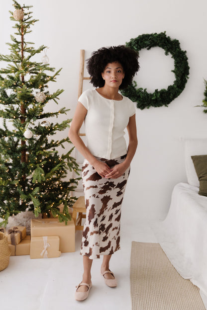 THE DAKOTA COW PRINT SKIRT IN CREAM