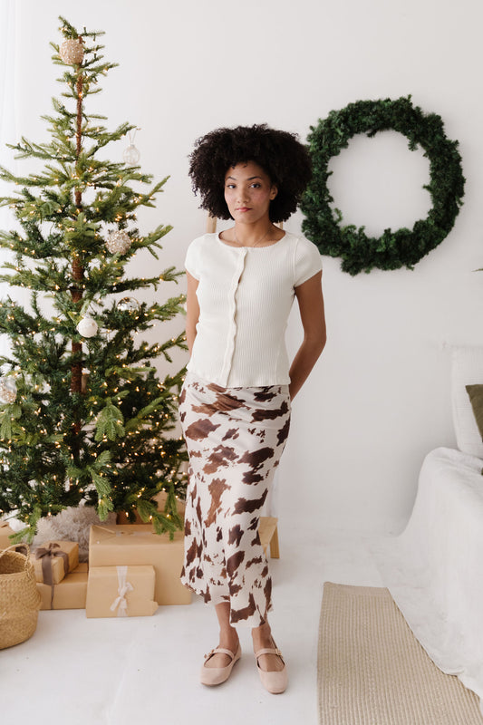 THE DAKOTA COW PRINT SKIRT IN CREAM
