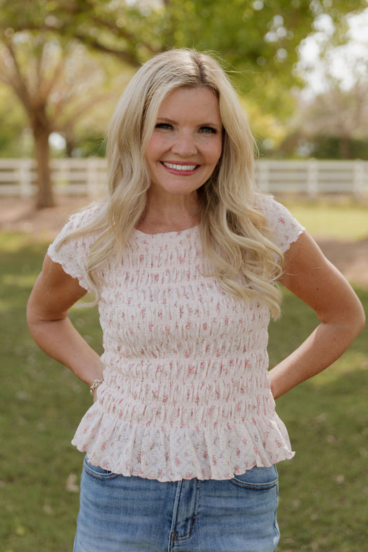 THE MADISON SMOCKED FLORAL TOP IN PINK