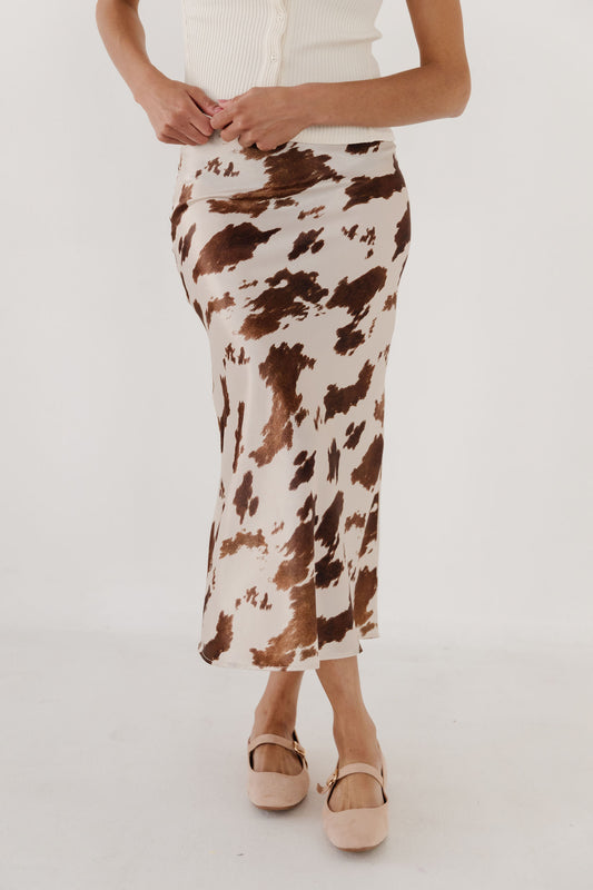 THE DAKOTA COW PRINT SKIRT IN CREAM