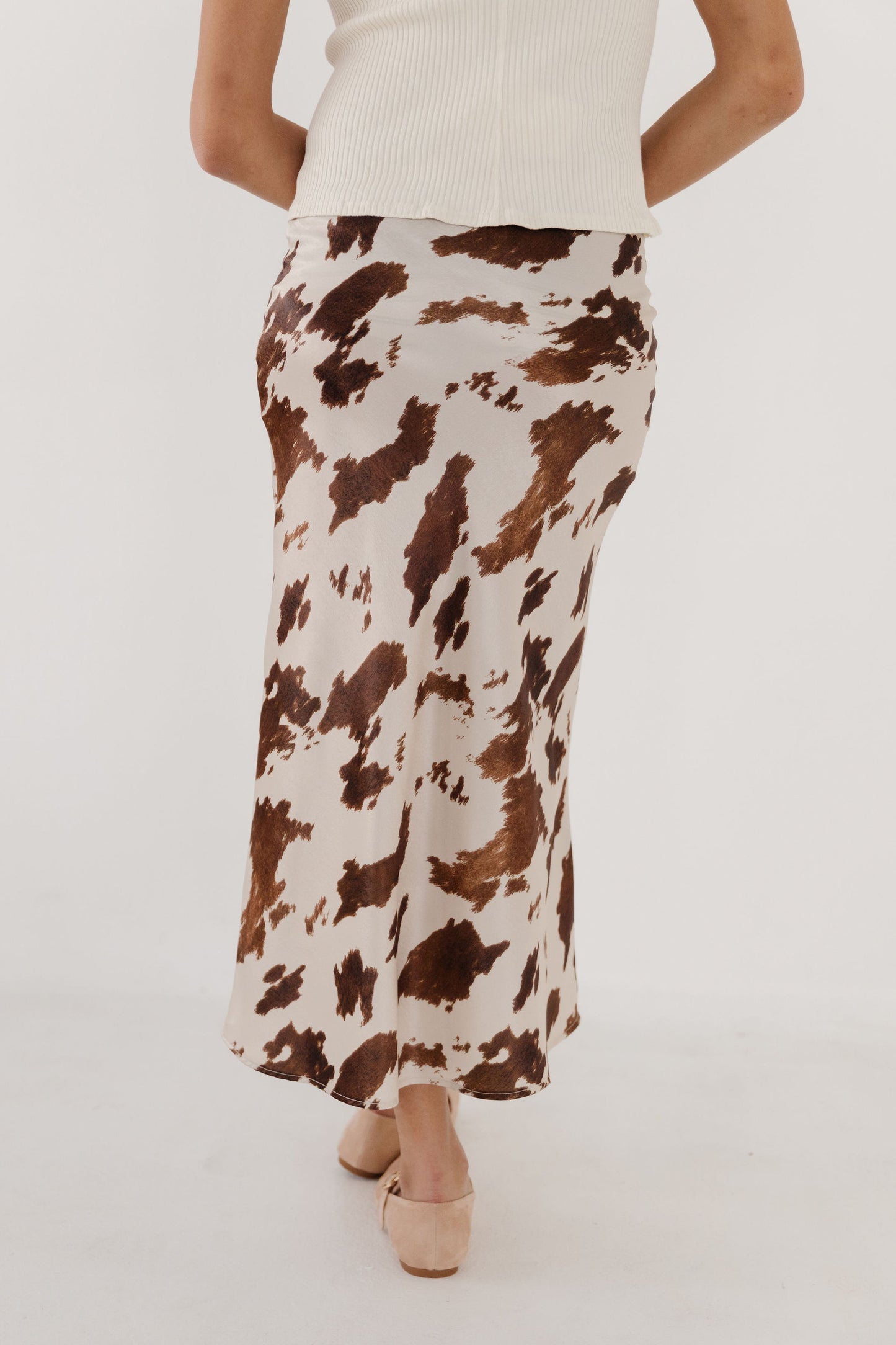 THE DAKOTA COW PRINT SKIRT IN CREAM
