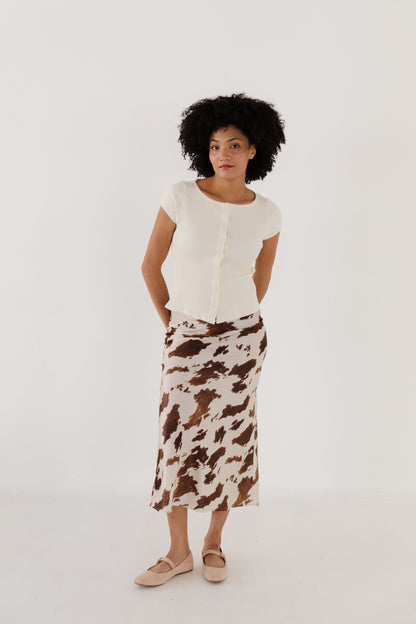 THE DAKOTA COW PRINT SKIRT IN CREAM