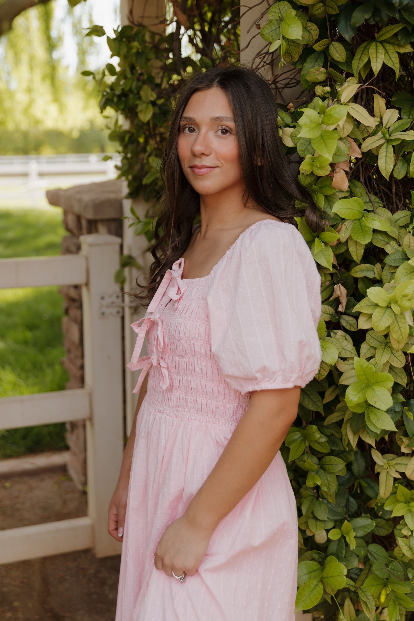THE SUZANNAH BOW DETAIL DRESS IN PINK