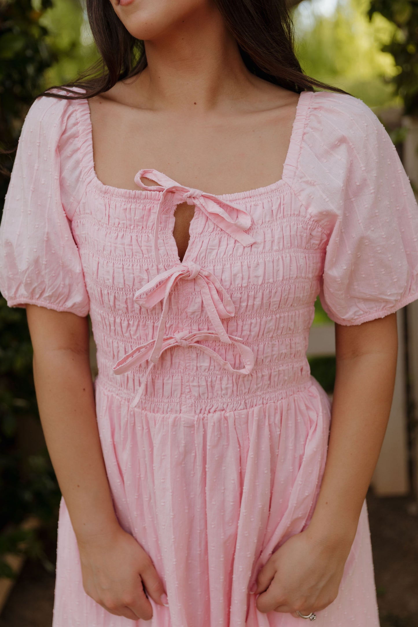 THE SUZANNAH BOW DETAIL DRESS IN PINK