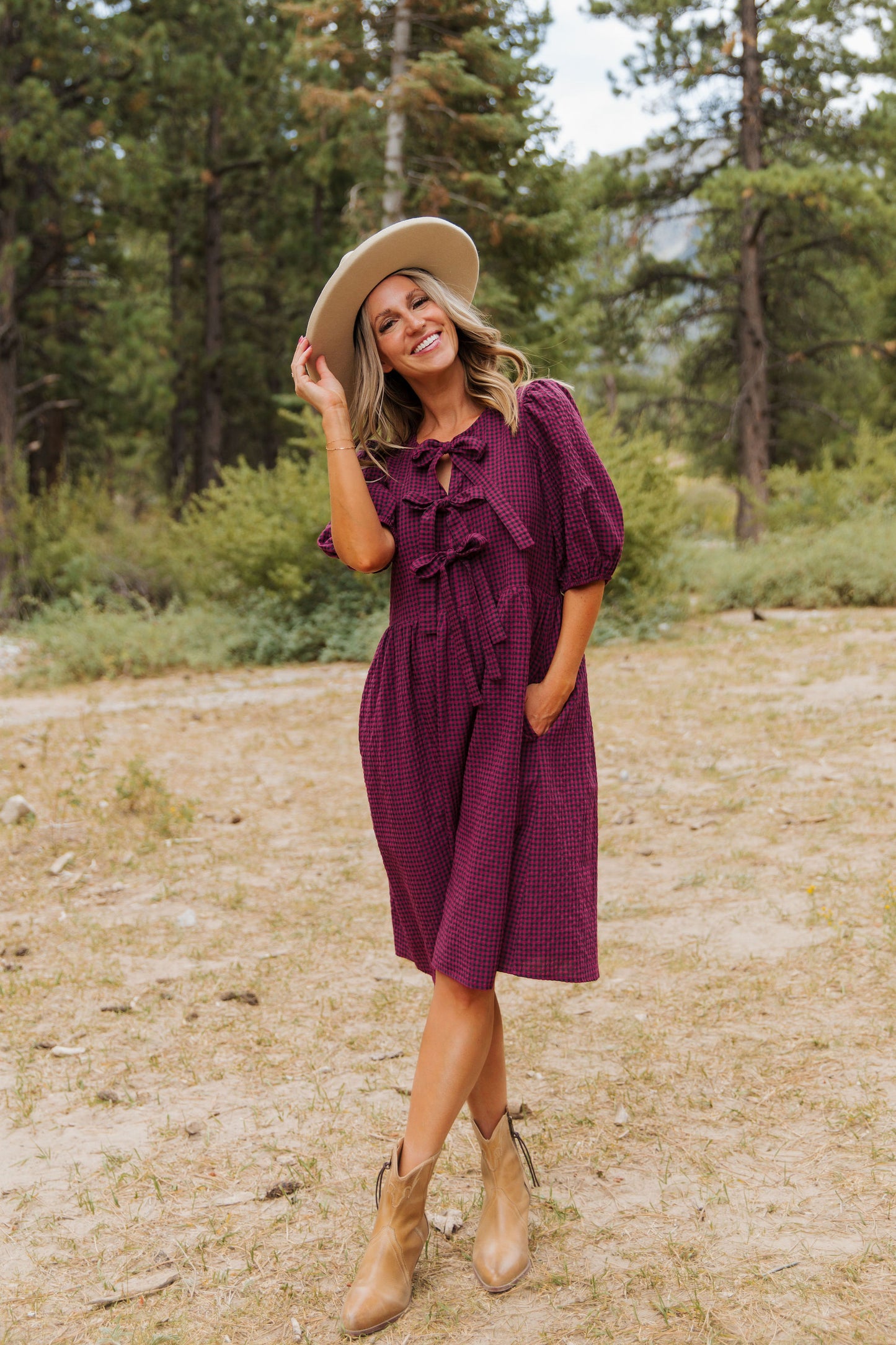 THE HARLOW BOW DRESS IN BURGUNDY CHECKERED BY PINK DESERT