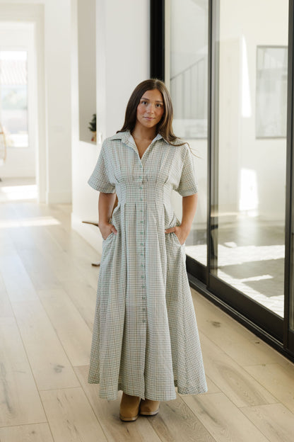 THE LYNNAE PLAID BUTTON DOWN DRESS IN FERN