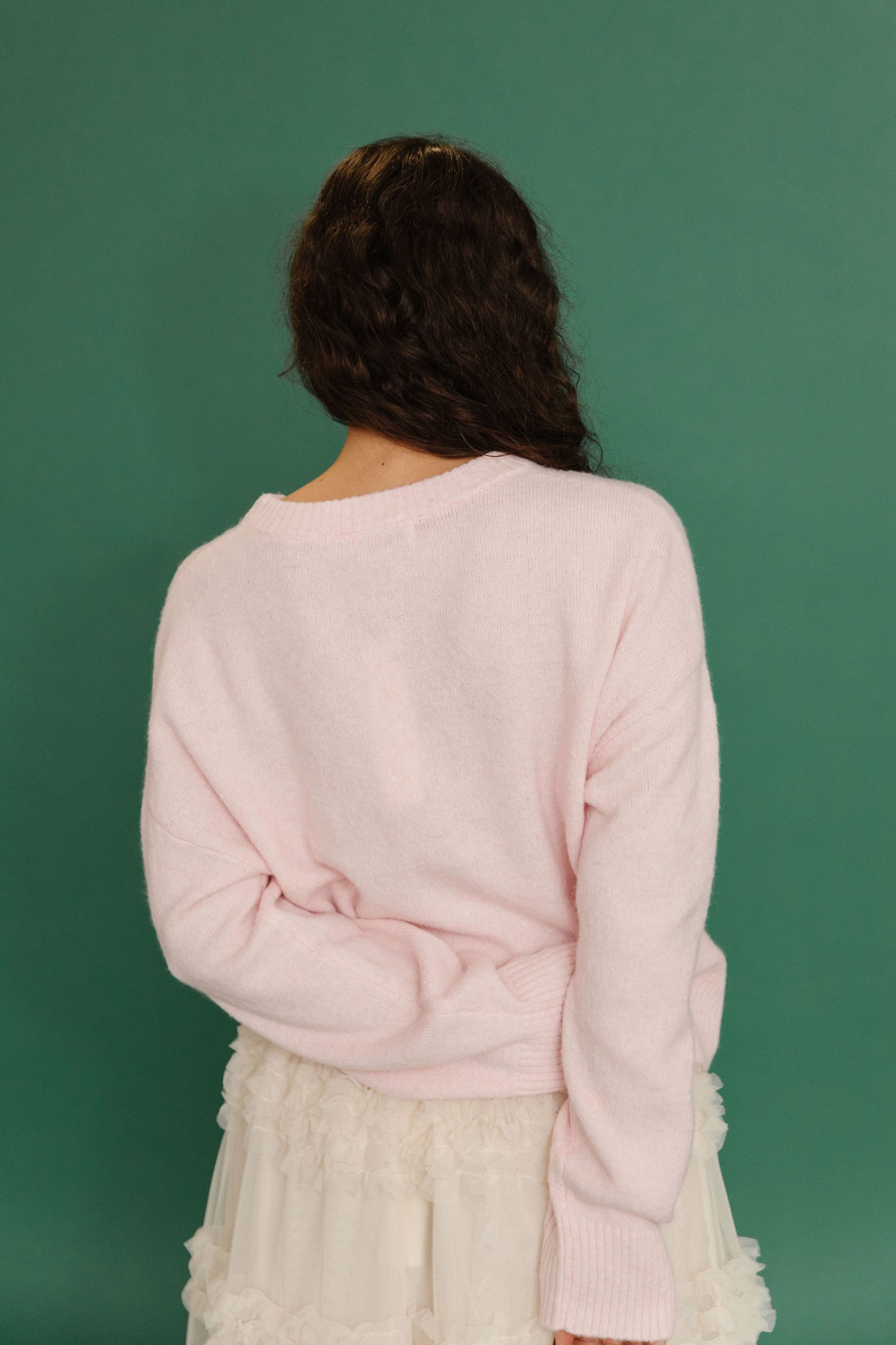 THE SWAN BOW GRAPHIC KNIT SWEATER IN PINK