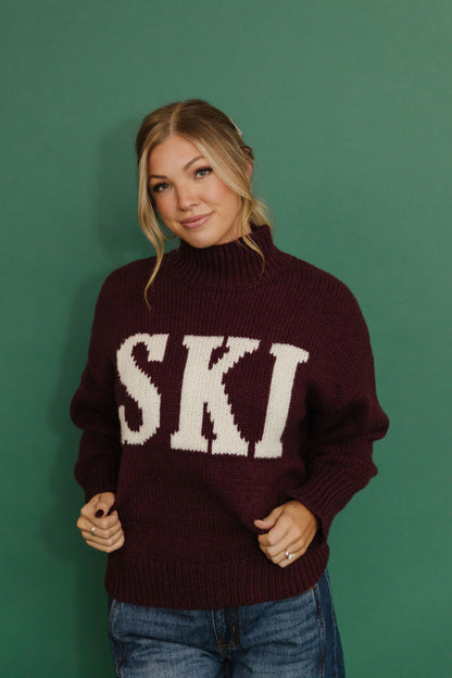 THE SKI ALL WINTER HIGH NECK SWEATER IN BURGUNDY