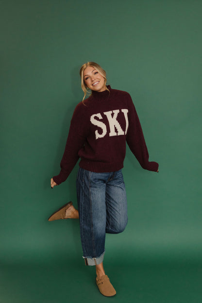THE SKI ALL WINTER HIGH NECK SWEATER IN BURGUNDY