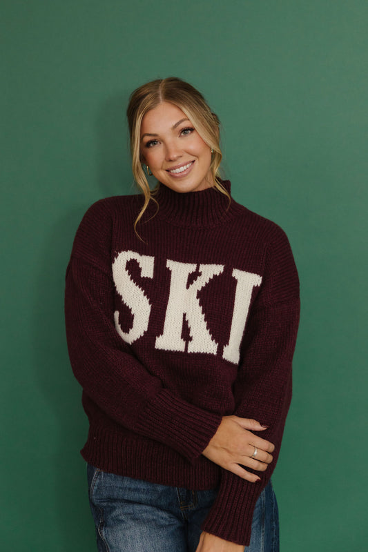 THE SKI ALL WINTER HIGH NECK SWEATER IN BURGUNDY