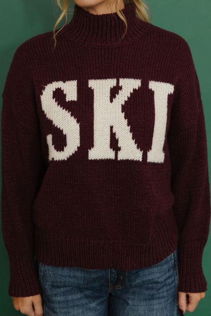 THE SKI ALL WINTER HIGH NECK SWEATER IN BURGUNDY