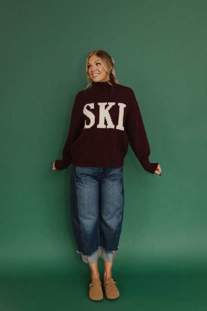 THE SKI ALL WINTER HIGH NECK SWEATER IN BURGUNDY