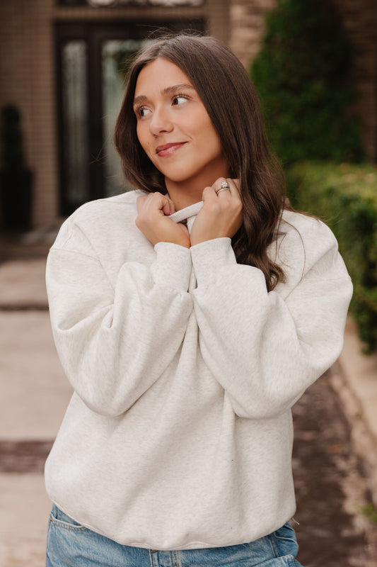 THE DIANNE MOCK NECK SWEATER IN WHITE MELANGE