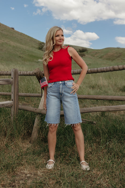 THE REMI SLEEVELESS FRILL TOP IN TOMATO RED